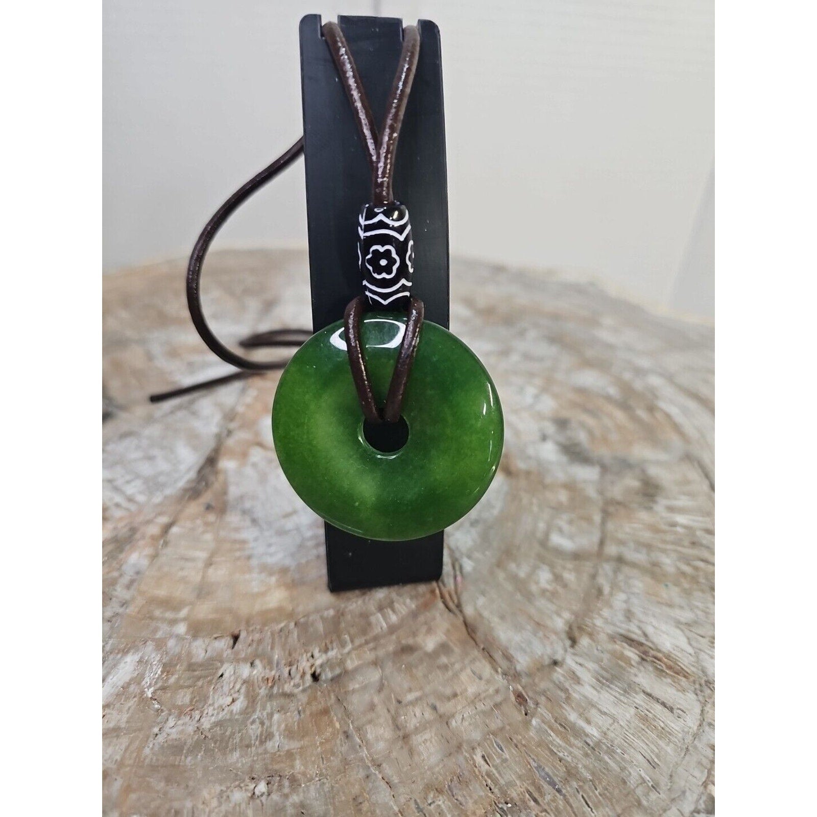 jade necklace Absolutely. Beautiful. With leather Strap