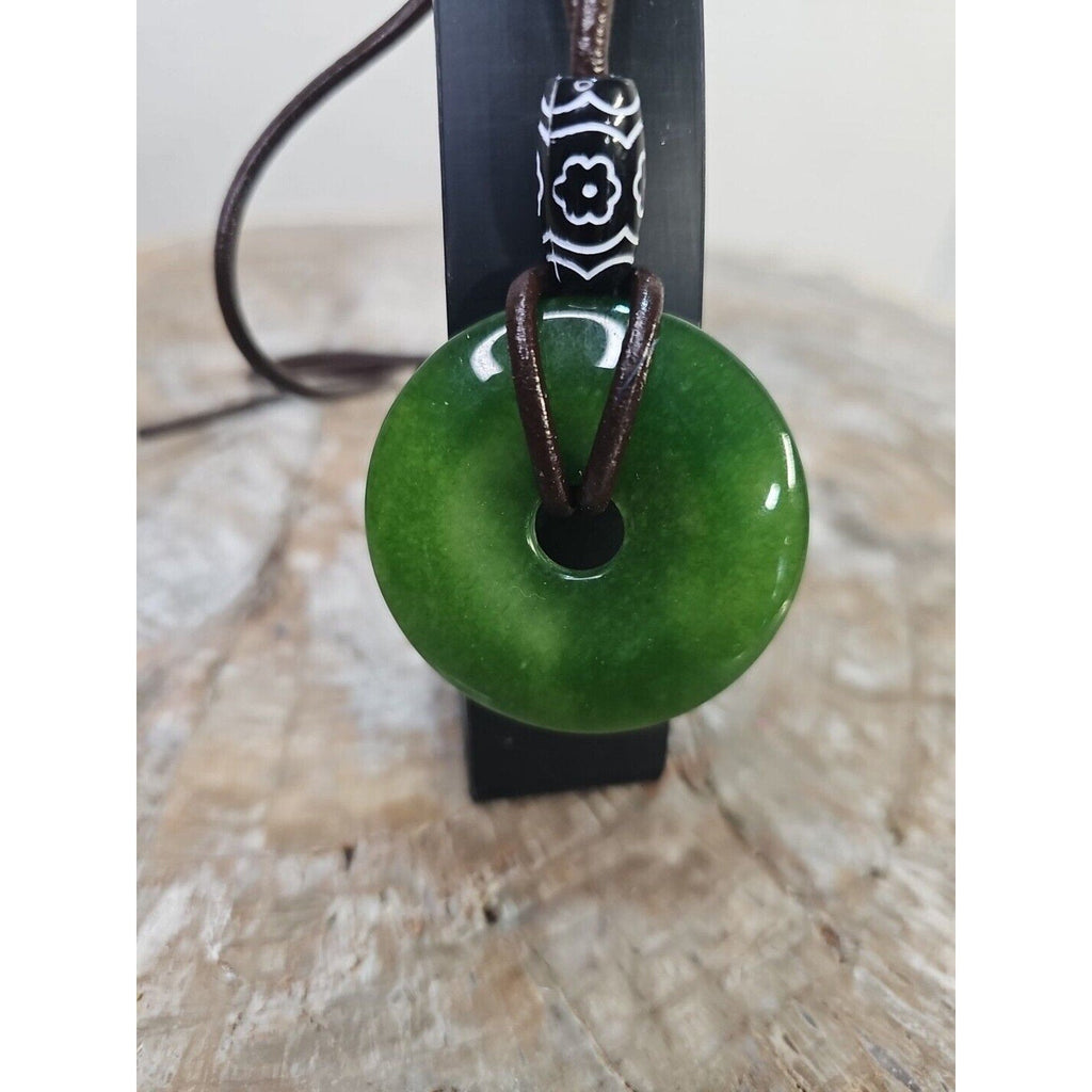 jade necklace Absolutely. Beautiful. With leather Strap
