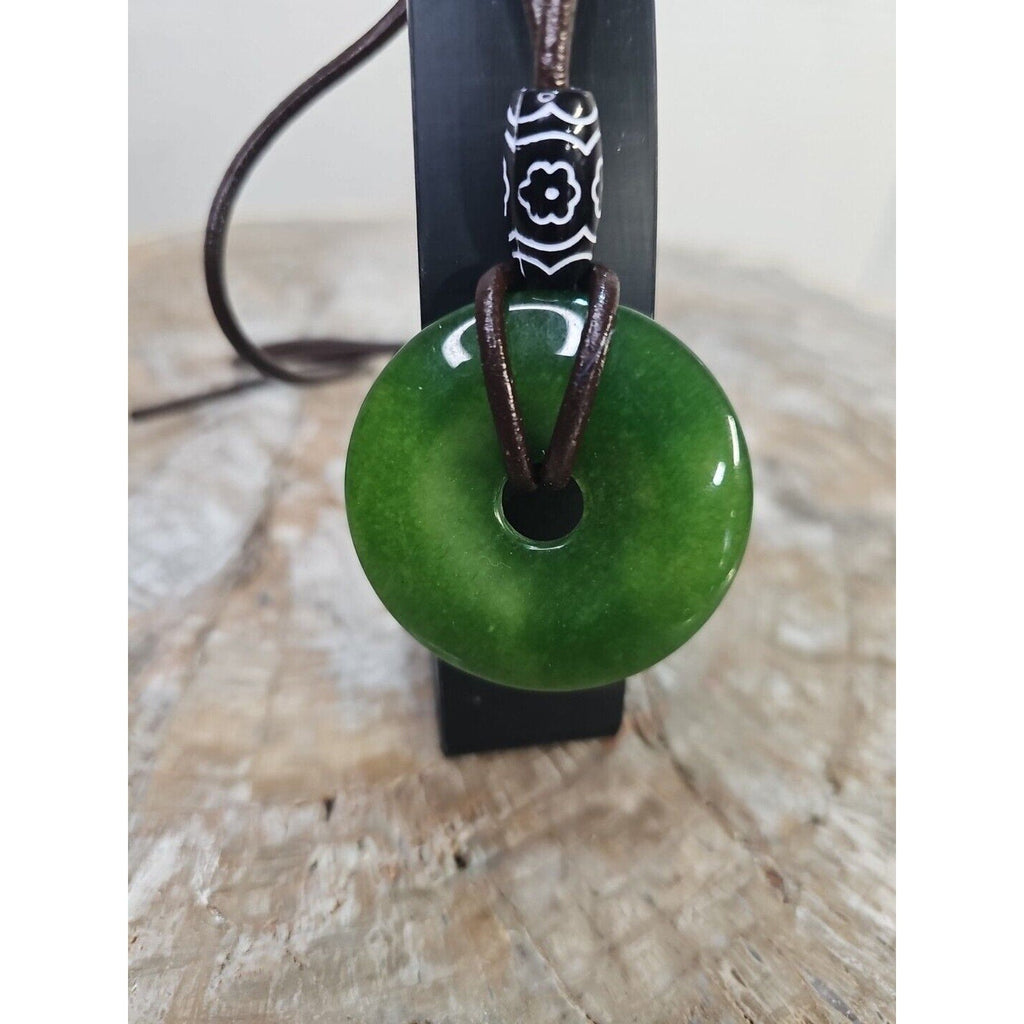 jade necklace Absolutely. Beautiful. With leather Strap