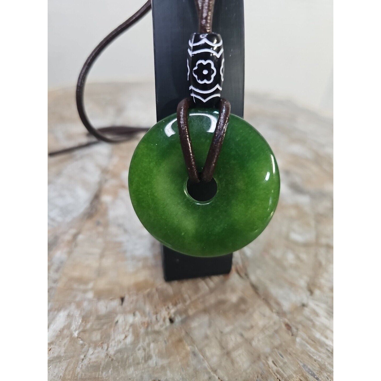 jade necklace Absolutely. Beautiful. With leather Strap