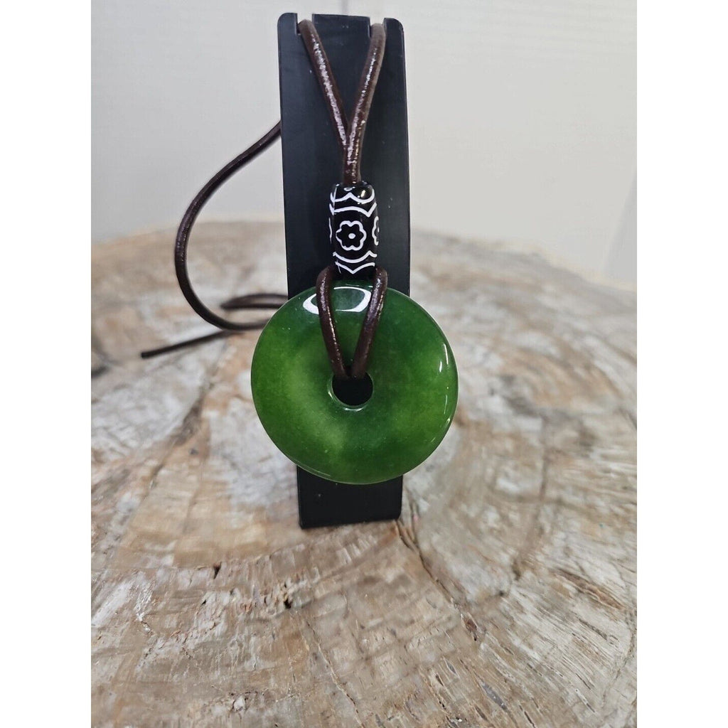 jade necklace Absolutely. Beautiful. With leather Strap
