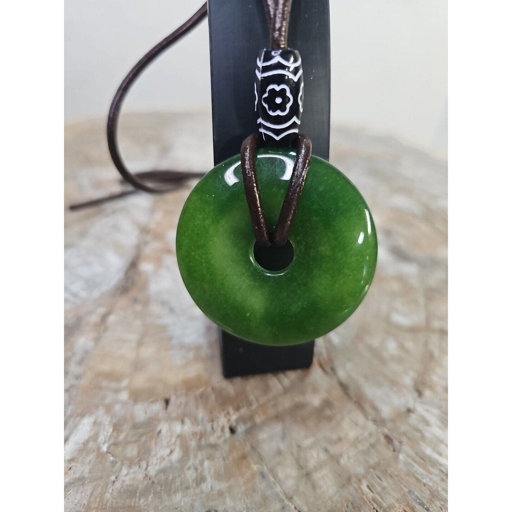 jade necklace Absolutely. Beautiful. With leather Strap