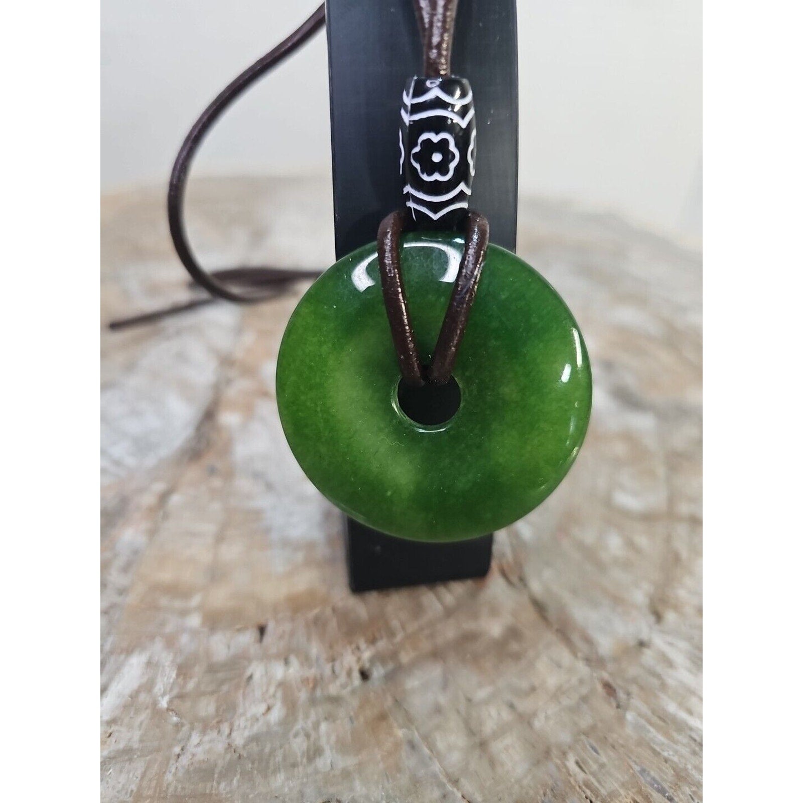 jade necklace Absolutely. Beautiful. With leather Strap