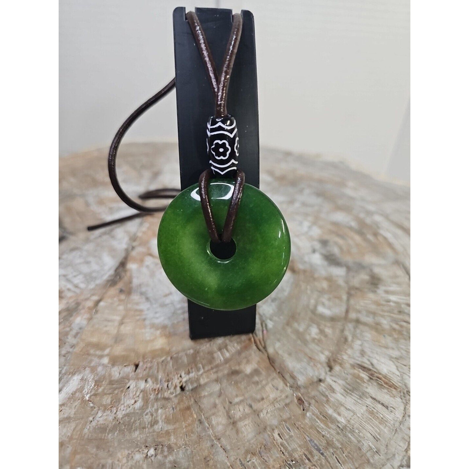jade necklace Absolutely. Beautiful. With leather Strap